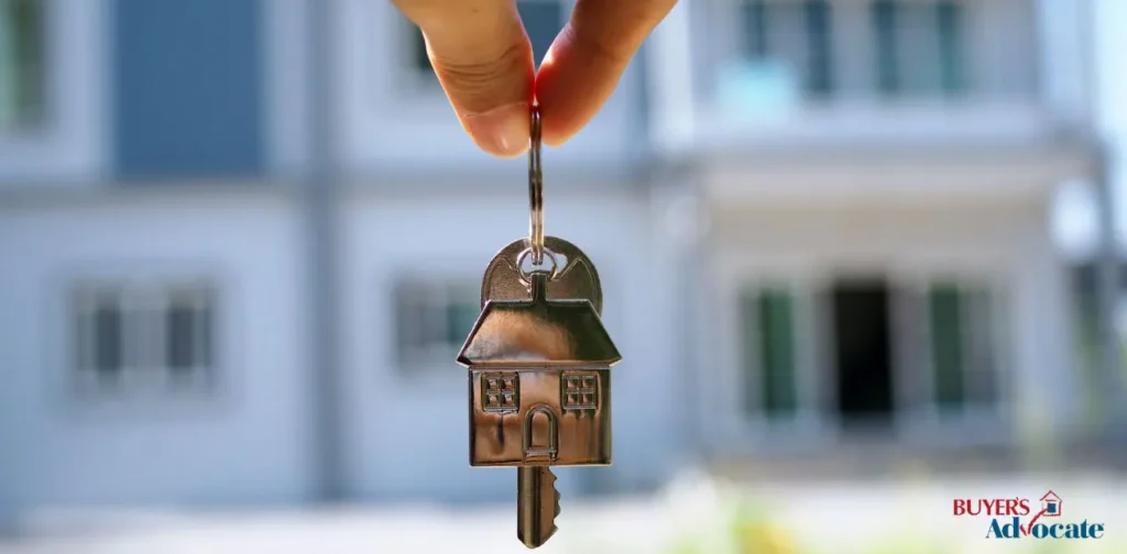 hand dangling house keys of new home
