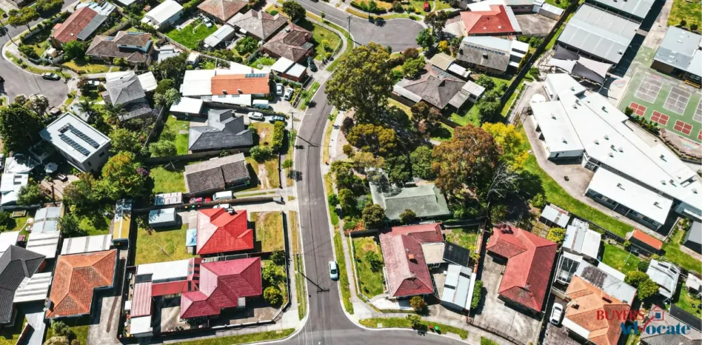 Aerial view of a Melbourne residential suburb showing detached houses, local roads, and school infrastructure, representing suburban housing trends in 2025.