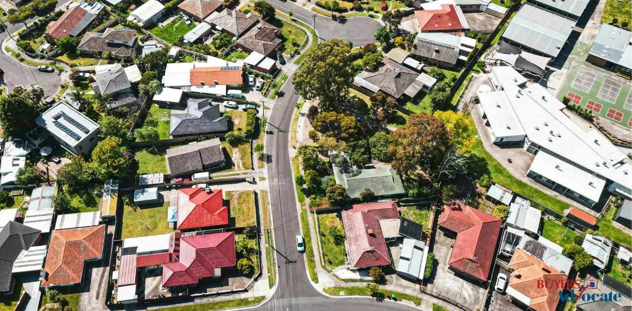 Aerial view of a Melbourne residential suburb showing detached houses, local roads, and school infrastructure, representing suburban housing trends in 2025.