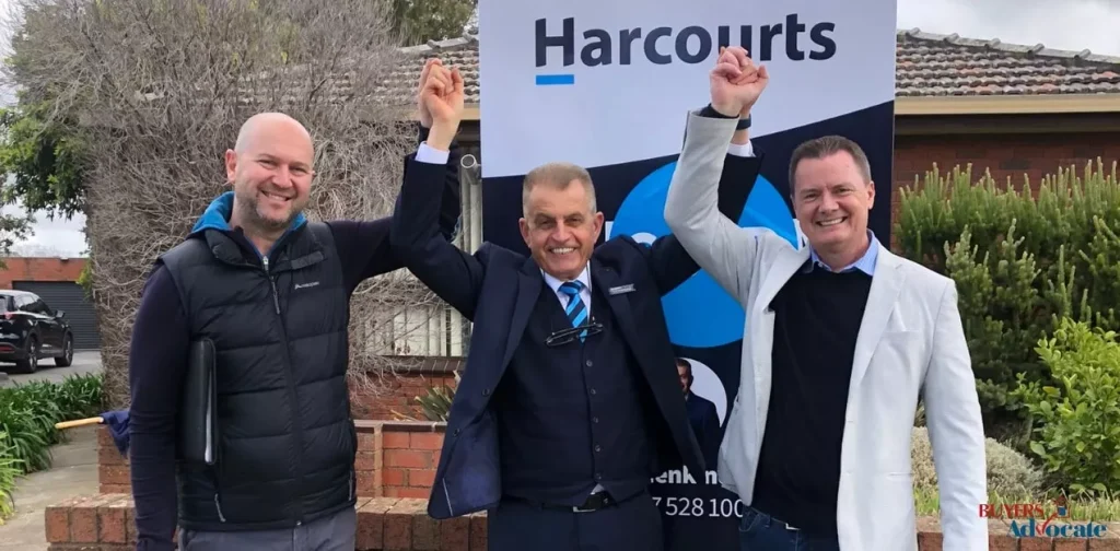 A Melbourne property manager poses with a landlord.